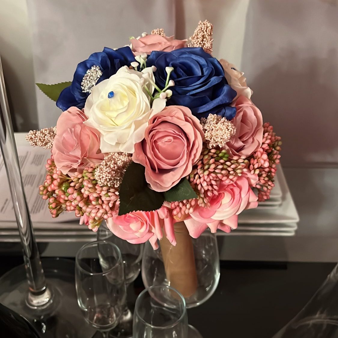 Blue pink and white roses